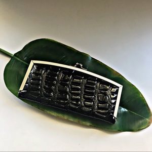 Black faux leather clutch wallet.